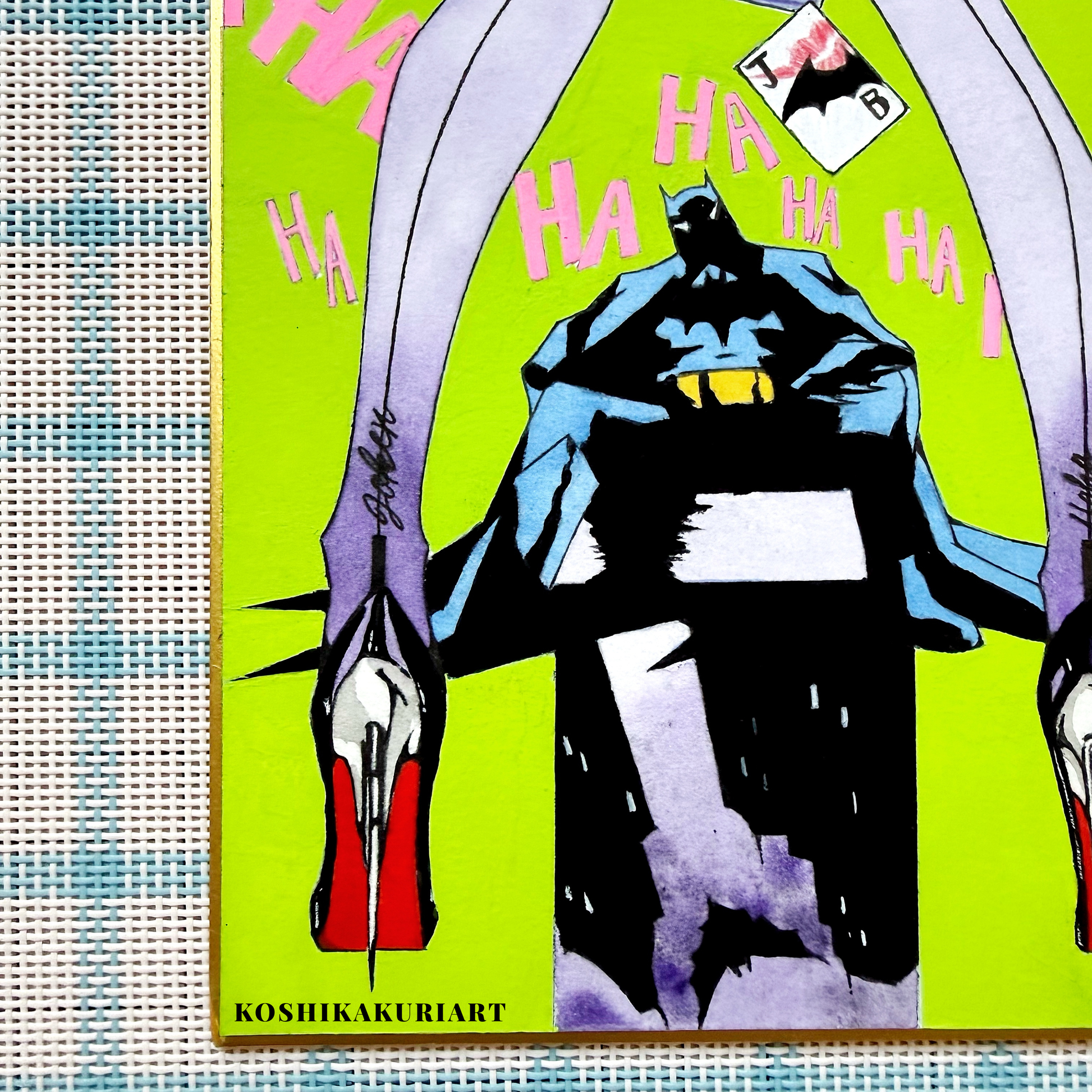 Close-up of "Red Sole" Batman Joker watercolor painting showing Daniel Smith mineral granulation on gold-edged Japanese Shikishi board.